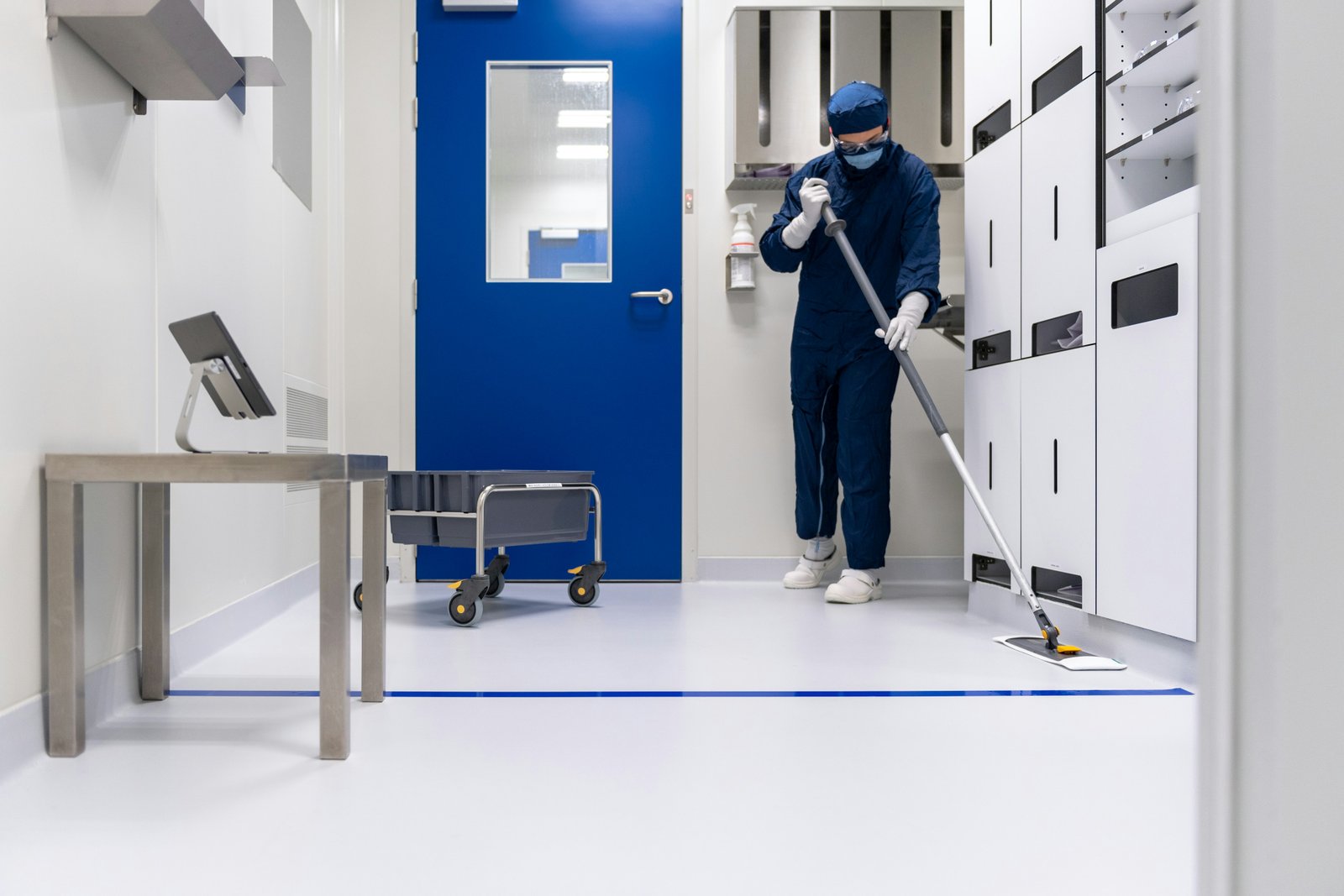 Disinfecting the floor of a sterile room